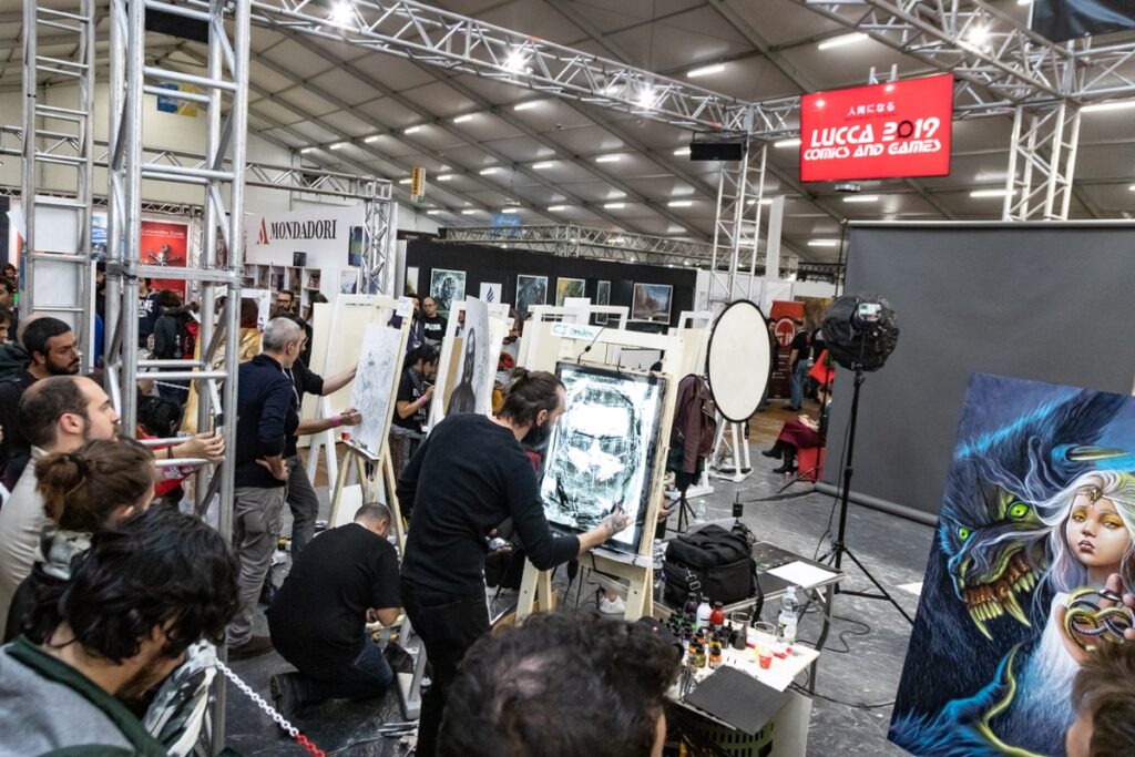 Artists creating live illustrations and fantasy artworks during Lucca Comics & Games.