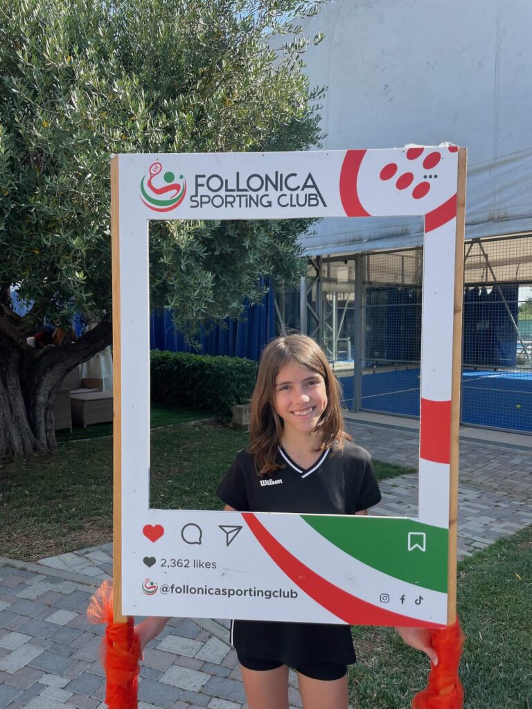 Where to Stay in Follonica: B&B Oltremare, a Top Choice on the Tuscan Coast 3 Young player from the Under 12 padel group posing at Follonica Sporting Club, Tuscany.