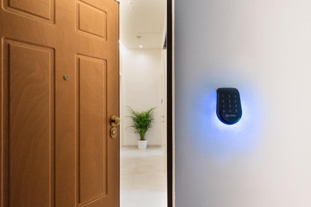 Where to Stay in Follonica: B&B Oltremare, a Top Choice on the Tuscan Coast 4 Secure entrance with digital keypad access at B&B Oltremare, Follonica.