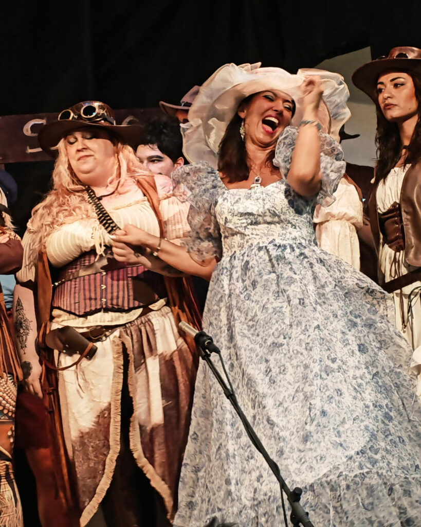 Actors performing on stage during the musical Far far west… Calamity Jane! 
