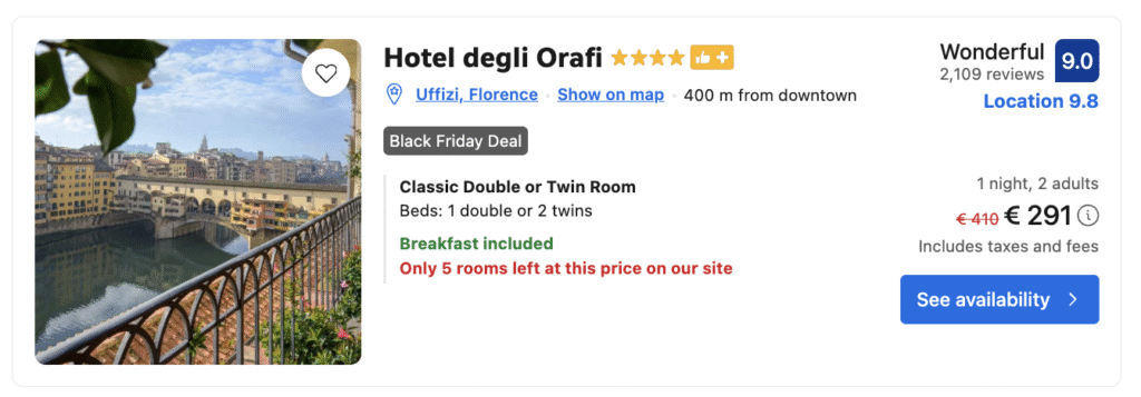 Terrace of Hotel degli Orafi overlooking the Arno River and Ponte Vecchio during Black Friday promotions.

