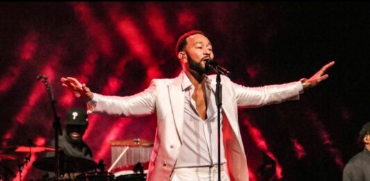 John Legend performs live — promotional photo for his “A Night of Songs and Stories” show at Lucca Summer Festival on Sunday, July 5, 2026.