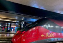 Italo 2×1 Train Deal in Italy: Save 50% on Train Travel to Florence and Tuscany Italo 2x1 Train Deal in Italy: Save on Train Travel to Florence and Tuscany - Red Italo high-speed train at the platform of Santa Maria Novella station in Florence, Tuscany
