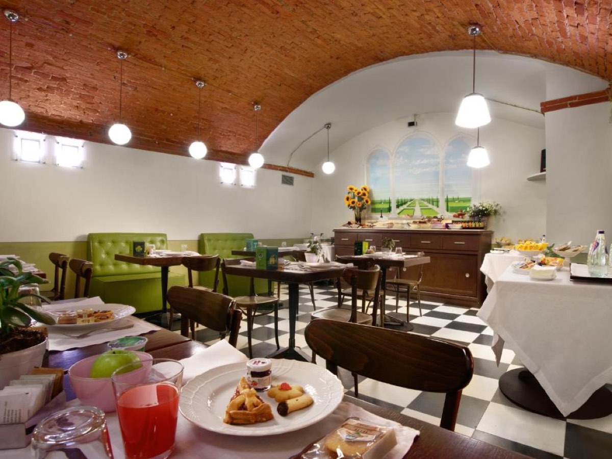 Best Arezzo Hotels for a Memorable Stay in Tuscany 14 Breakfast room with brick vaulted ceiling at Graziella Patio Hotel, Arezzo