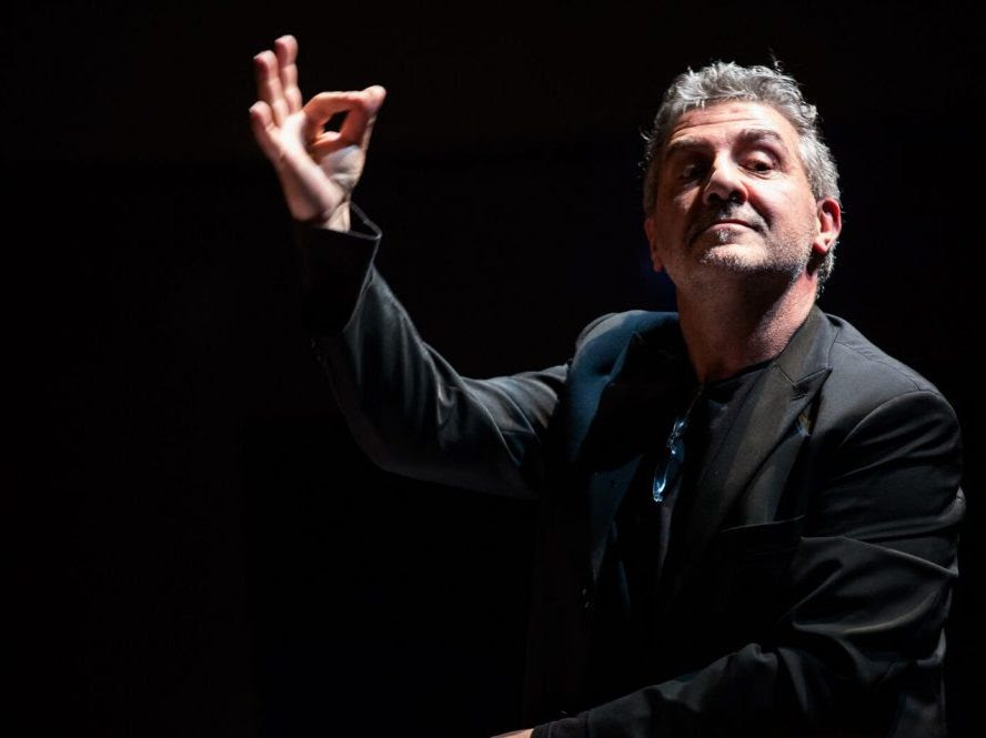 Conductor leading a concert at the Orbetello Jazz Festival