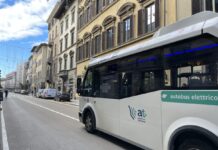 Tuscany Strike on October 14: Train and Bus Times White electric Autolinee Toscane minibus on a street in central Florence